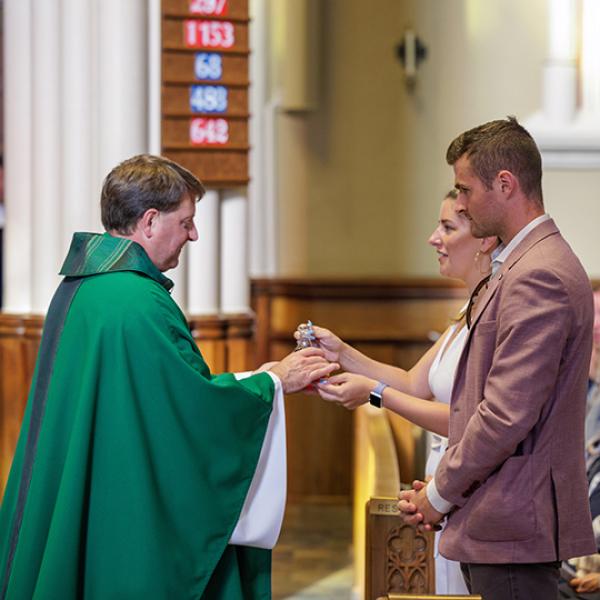 ACE teachers present offertory gifts at Baccalaureate Mass.