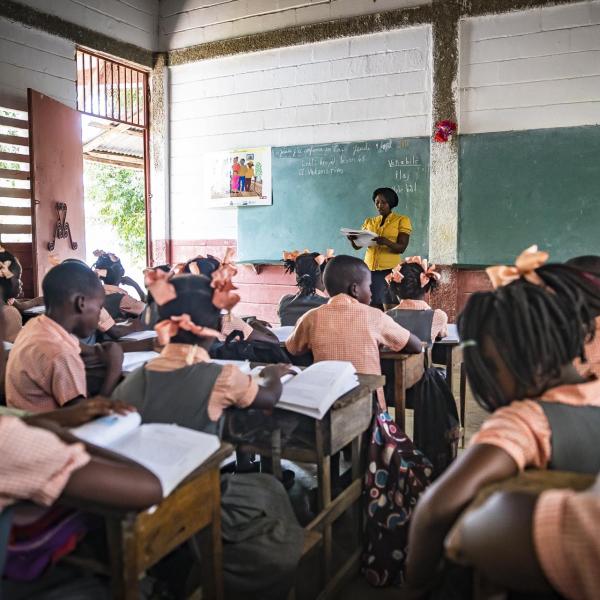 Children and teacher in Haitian classroom