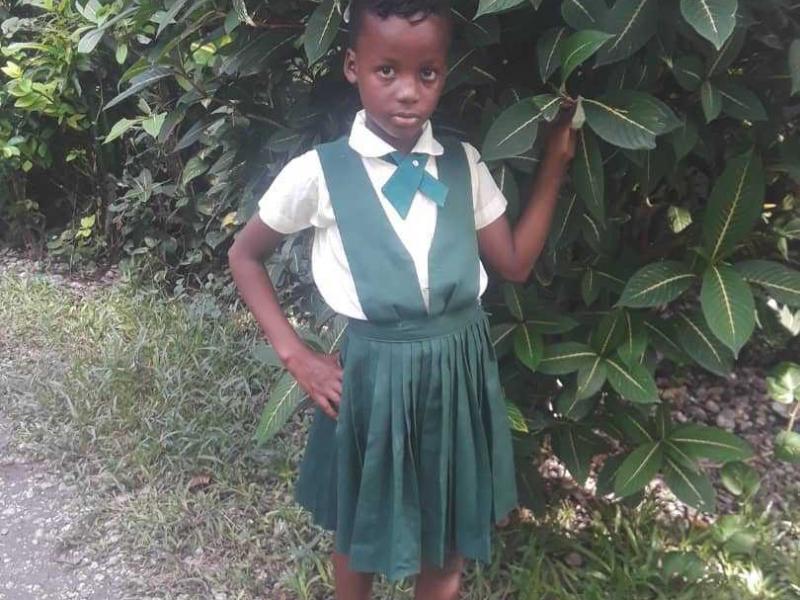 Wilelmine posing in school uniform