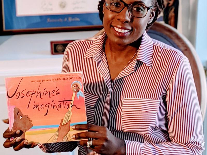 Anasthasie with her favorite book
